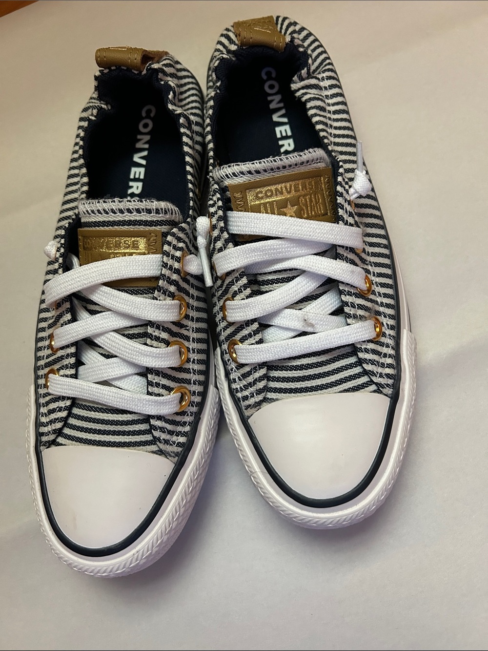 Converse Women’s Striped Low Top Sneakers in Black, White & Gold